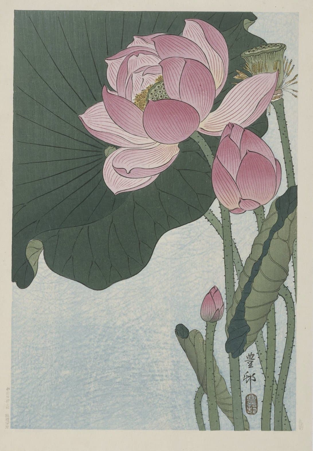 A woodblock print of lotus flowers — pink petals opening over one wide green leaf.